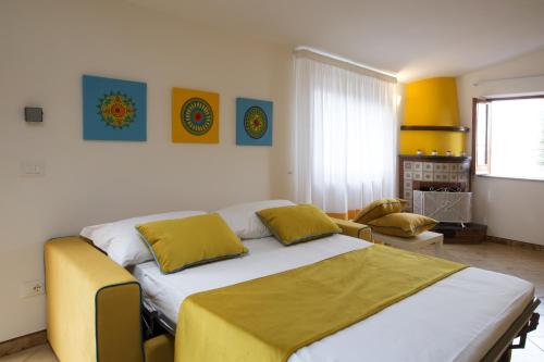 A bed or beds in a room at Relais Villa Chiara free parking