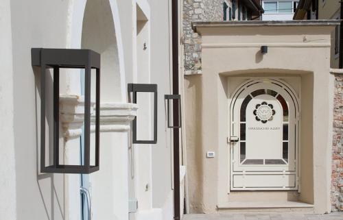a door to a building with a sign on it at Villa di Cazzano - BioLuxury Living in Soave