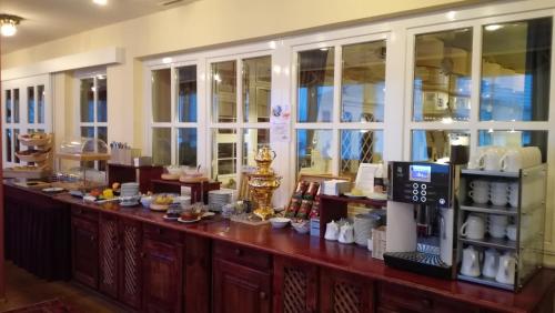 a kitchen with a counter with food on it at Liezenerhof in Liezen