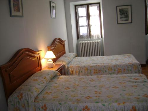 Ένα ή περισσότερα κρεβάτια σε δωμάτιο στο Hostal Venta San Blas