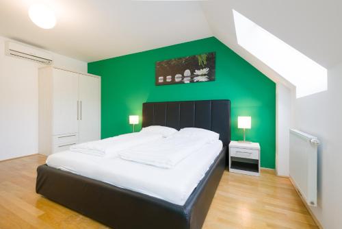 Кровать или кровати в номере Vienna Stay Apartments Pezzl 1170
