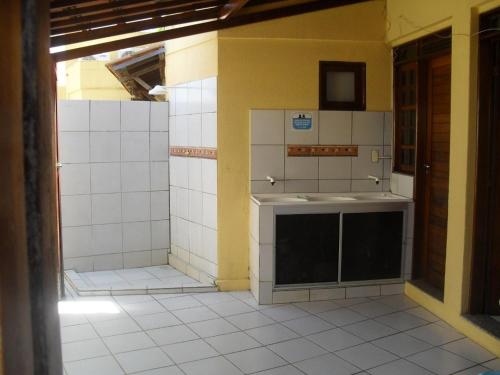 Koupelna v ubytování Duplex com piscina e churrasqueira