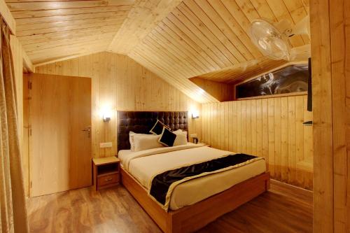 Ένα ή περισσότερα κρεβάτια σε δωμάτιο στο Hill County Resort & Spa