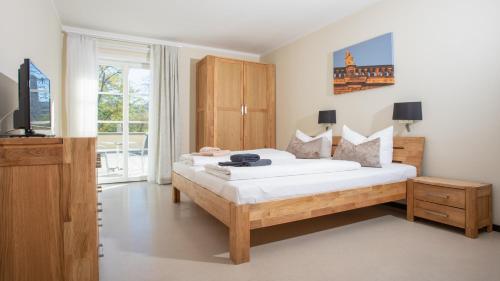 Postel nebo postele na pokoji v ubytování Hofgärtnerhaus