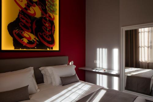 The Frame Hotelにあるベッド