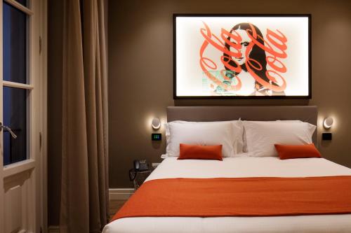 The Frame Hotelにあるベッド