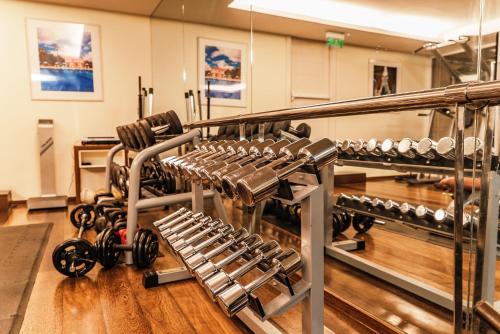 a row of dumbbell racks in a gym at Copacabana Palace, A Belmond Hotel, Rio de Janeiro in Rio de Janeiro