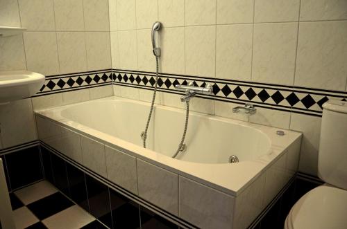 Kylpyhuone majoituspaikassa Vakantiepark Timmerholt