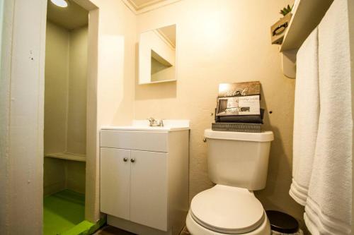 a bathroom with a toilet and a sink at Hays #B Near Downtown Guest Studio in San Antonio