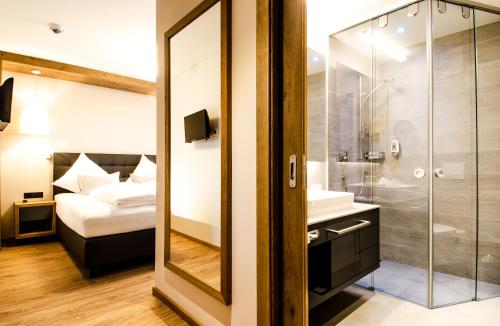 Koupelna v ubytování Hotel Garni Funtana