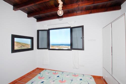 Posteľ alebo postele v izbe v ubytovaní Apartamento PANCHO