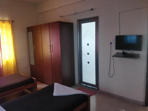 TV a/nebo společenská místnost v ubytování Tulip Suites