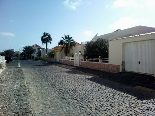 a cobblestone street in front of a house at Solmar apartment in Beirona