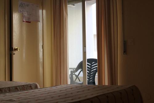 Postel nebo postele na pokoji v ubytování Hostal Andalucia