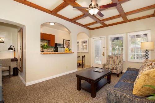 a living room with a couch and a table at El Cordova in San Diego