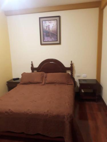 A bed or beds in a room at El Marquez