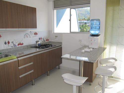Kuchyň nebo kuchyňský kout v ubytování Condominio Terrazas del Sol