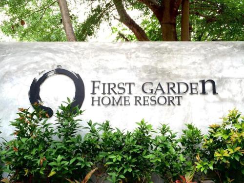 a sign for the first garden home resort at First Garden Home Resort in Si Sa Ket