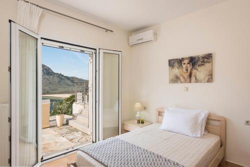 Katil atau katil-katil dalam bilik di Bluefairy Villas