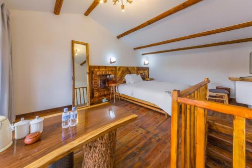 Postel nebo postele na pokoji v ubytování Chunjian Guesthouse