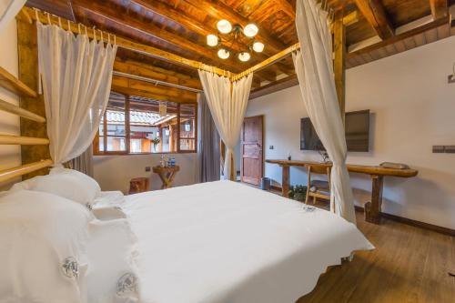 Postel nebo postele na pokoji v ubytování Chunjian Guesthouse