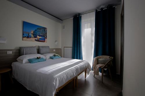 Postel nebo postele na pokoji v ubytování Casa Borgo Regina B&B - Bari Puglia Apartments