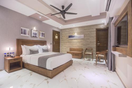 Cama o camas de una habitación en Samann Grand