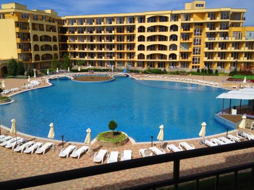 a large swimming pool in front of a hotel at PSB Apartments in Midia Resort Aheloy in Aheloy