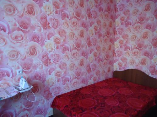 Ein Bett oder Betten in einem Zimmer der Unterkunft Апартаменты на Осипенко