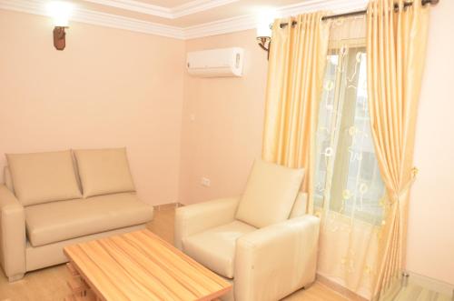 Zona de estar de SSCFG APTMS & SUITES - SAMMY's PLACE