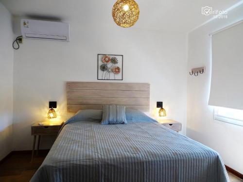 Postel nebo postele na pokoji v ubytování Los Caracoles Piscina & Spa