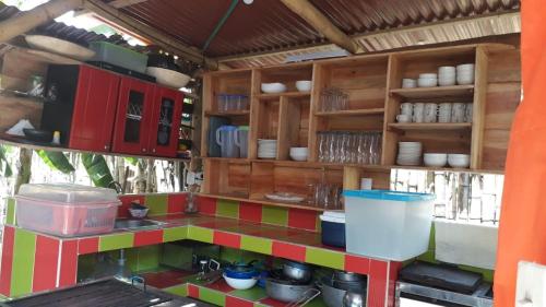 Una cocina o cocineta en Hostel Cattleya
