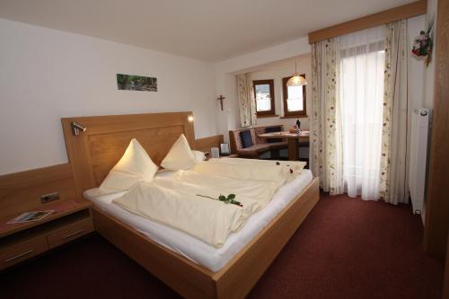 Postel nebo postele na pokoji v ubytování Haus Rosi