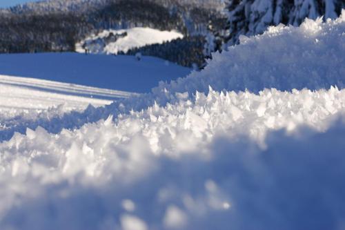 a pile of snow on the side of a mountain at Gasteg Living in Maria Alm am Steinernen Meer