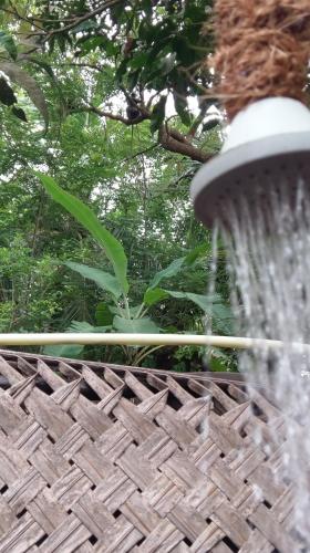 a close up of a water fountain at Hidden Well Hiriketiya in Hiriketiya