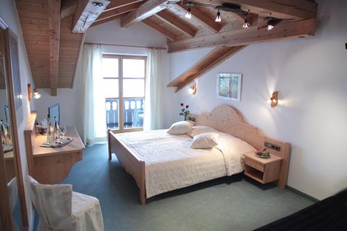 Ein Bett oder Betten in einem Zimmer der Unterkunft Hotel Garni Georgenhof Adults Only