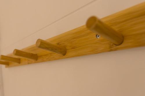 a wooden shelf on a wall at Suzhou Blue Gate Youth Hostel in Suzhou