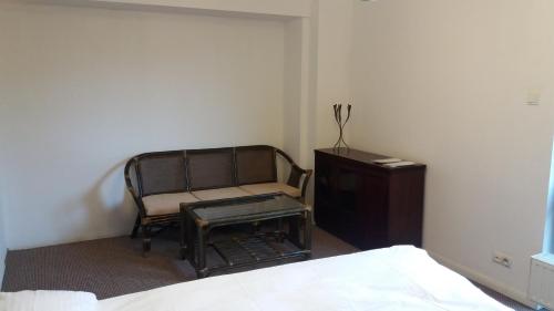 Ένα ή περισσότερα κρεβάτια σε δωμάτιο στο APARTAMENTY HIEROWSKIEGO 60G