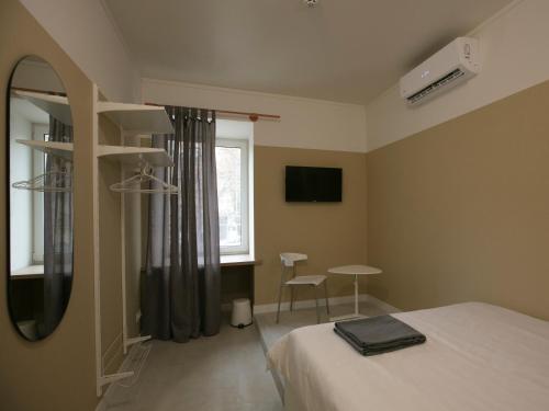 Postel nebo postele na pokoji v ubytování Hotel 0482