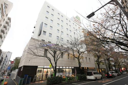 a large white building on a city street at Center Hotel Tokyo in Tokyo