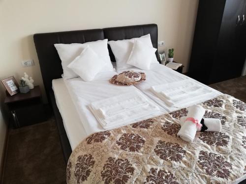 Een bed of bedden in een kamer bij Martin'Suite