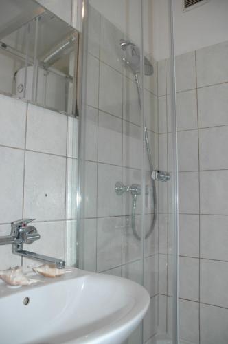 Kylpyhuone majoituspaikassa Apartament Rodzinny S7