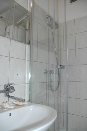 Kúpeľňa v ubytovaní Apartament Rodzinny S7