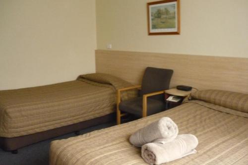 Cama o camas de una habitación en Acacia Motor Inn
