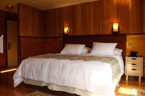 Postel nebo postele na pokoji v ubytování Hotel Aliwen