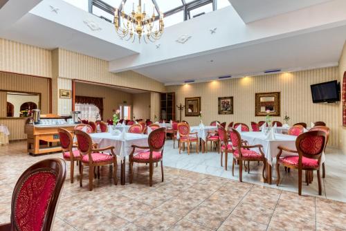 TV a/nebo společenská místnost v ubytování Hotel Gracja