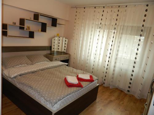 Кровать или кровати в номере Apartament Antonia
