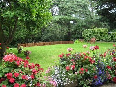 A garden outside Lysses House Hotel 