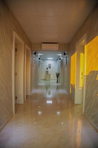 an empty hallway in a building with a hallway at Mark's Palace in Nikšić