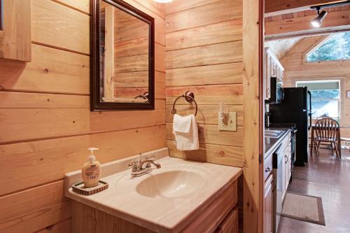 a bathroom with a sink in a log cabin at Moose in South Fork